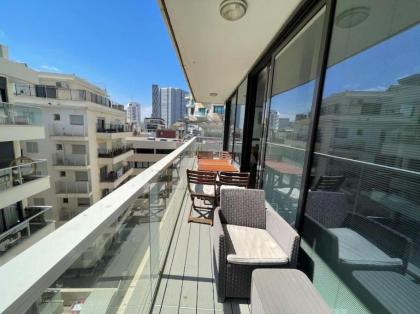 Modern Beachfront Haven 3BR w/parking by HolyGuest - image 10