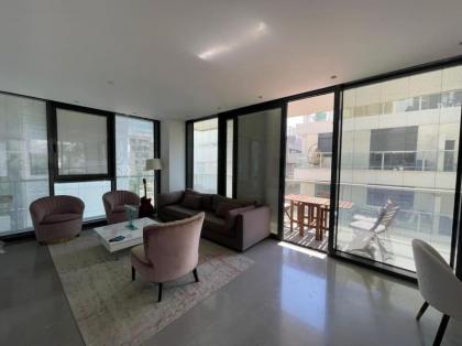 Modern Beachfront Haven 3BR w/parking by HolyGuest - image 3