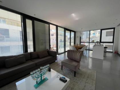 Modern Beachfront Haven 3BR w/parking by HolyGuest - image 9