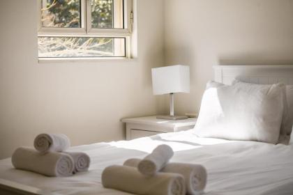 Chic 2BR Apt w Large Windows in Tel Aviv Old North Sea N' Rent - image 11