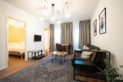 Elegant apartment with wood tables.